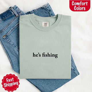 He’s Fishing Comfort Colors Tee – Funny Relaxed Fit Shirt for Women - A Roese Boutique