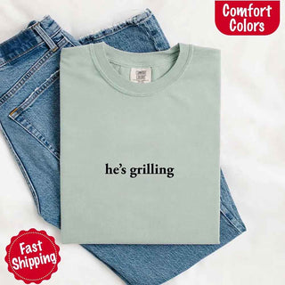He’s Grilling – Funny Summer BBQ Comfort Color Shirt for Women - A Roese Boutique