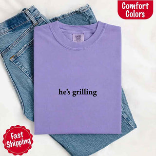 He’s Grilling – Funny Summer BBQ Comfort Color Shirt for Women - A Roese Boutique