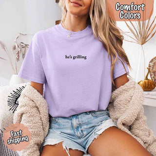 He’s Grilling – Funny Summer BBQ Comfort Color Shirt for Women - A Roese Boutique