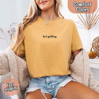 He’s Grilling – Funny Summer BBQ Comfort Color Shirt for Women - A Roese Boutique