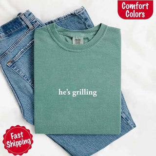 He’s Grilling – Funny Summer BBQ Comfort Color Shirt for Women - A Roese Boutique