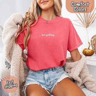 He’s Grilling – Funny Summer BBQ Comfort Color Shirt for Women - A Roese Boutique
