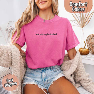 He’s Playing Basketball – Funny Sports Girlfriend Comfort Color Shirt for Women - A Roese Boutique