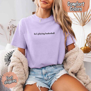 He’s Playing Basketball – Funny Sports Girlfriend Comfort Color Shirt for Women - A Roese Boutique