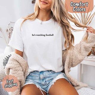 He’s Watching Football Tee - Comfort Colors Funny Shirt for Her - A Roese Boutique