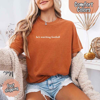 He’s Watching Football Tee - Comfort Colors Funny Shirt for Her - A Roese Boutique