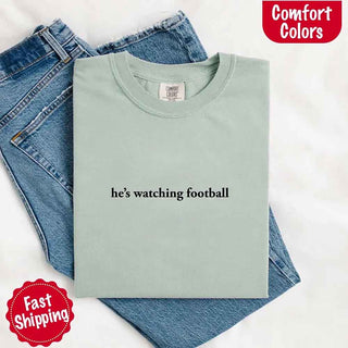 He’s Watching Football Tee - Comfort Colors Funny Shirt for Her - A Roese Boutique